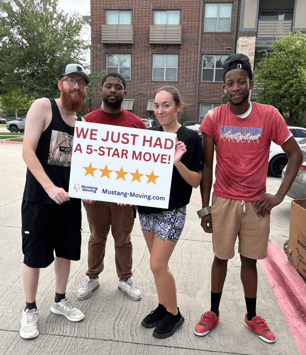 Mustang Moving customer Marcus T. with three crew members after an apartment move.